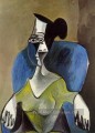 Femme assise dans un fauteuil bleu 1962 cubiste Pablo Picasso